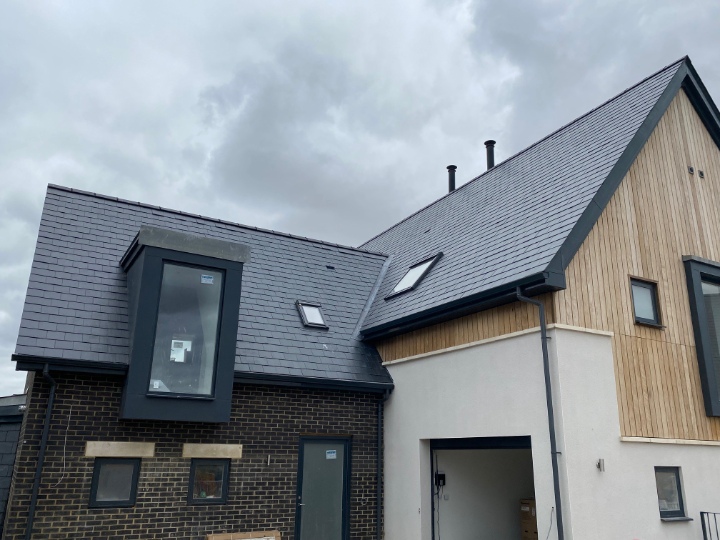 SSQ Del Prado natural slate roof on contemporary lakeside homes at Lakeview Crescent, Chelmsford