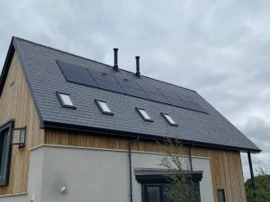 Angled roof view highlighting the elegant finish of SSQ Del Prado slate on bespoke homes