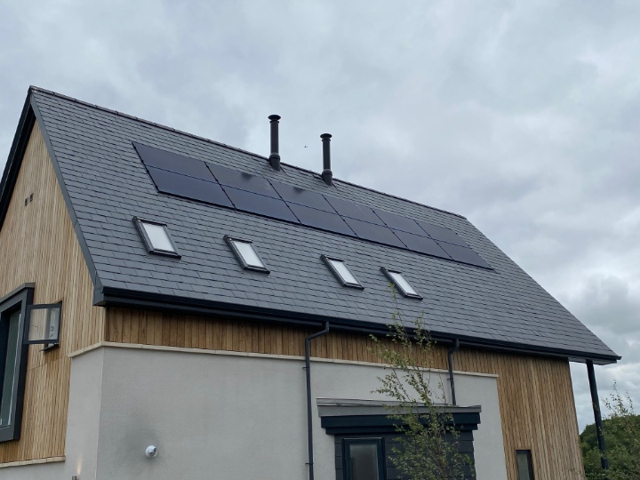 Angled roof view highlighting the elegant finish of SSQ Del Prado slate on bespoke homes