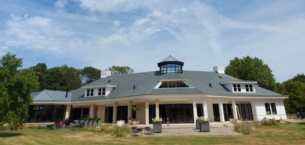 Front of modern villa with roof featuring Riverstone natural slate